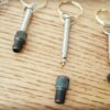Porte-clés en valve + adaptateur